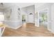 Bright foyer with gleaming floors, high ceilings, neutral walls, and views of the living areas at 1115 Maremont Ct, Matthews, NC 28104