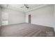 Large bedroom with tray ceilings leading to en-suite bathroom with a tub at 1213 Margo Mannor Dr, Fort Mill, SC 29708