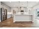 Bright, modern kitchen with stainless steel appliances, a large island, and sleek gray cabinetry at 1213 Margo Mannor Dr, Fort Mill, SC 29708