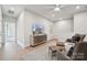Cozy living room features a TV, seating, and decor for a comfortable and inviting atmosphere at 1213 Margo Mannor Dr, Fort Mill, SC 29708
