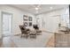 Comfortable living room with seating, rug, and ample space perfect for relaxation and entertaining at 1213 Margo Mannor Dr, Fort Mill, SC 29708