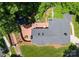 Aerial view of the home showcasing the brick patio, landscaped garden, and spacious backyard at 1226 Tarrington Ave, Charlotte, NC 28205