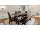 Dining room with a unique table, modern chairs, and a cozy atmosphere, perfect for entertaining at 1226 Tarrington Ave, Charlotte, NC 28205