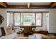 Living room with hardwood floors, large window, and natural light at 1226 Tarrington Ave, Charlotte, NC 28205