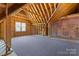 This partially finished attic space presents an opportunity for customization and expansion at 1280 Winged Foot Dr, Denver, NC 28037