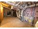 Unfinished basement features mechanical components and storage shelving at 1280 Winged Foot Dr, Denver, NC 28037