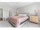 This primary bedroom has a soft carpet, neutral paint, and ceiling fan for a cozy and comfortable feel at 1280 Winged Foot Dr, Denver, NC 28037