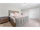 Bedroom featuring a gray wooden bed frame, carpeted floors, and a matching nightstand at 1280 Winged Foot Dr, Denver, NC 28037