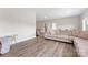 Spacious living room features recessed lighting, hardwood floors and comfortable seating at 1280 Winged Foot Dr, Denver, NC 28037