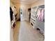 Spacious walk-in closet with custom shelving and ample storage at 1280 Winged Foot Dr, Denver, NC 28037
