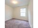 Bedroom with neutral carpet and walls at 13022 Hill Pine Rd, Midland, NC 28107