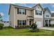 Charming two-story home with neutral siding, dark shutters, manicured lawn, and a one-car garage at 13022 Hill Pine Rd, Midland, NC 28107