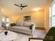 Cozy living room furnished with a comfortable couch, stylish decor, and a bright area rug, ideal for entertaining at 13022 Hill Pine Rd, Midland, NC 28107