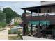 Summit Coffee with outdoor seating area and view of a neighborhood at 1315 Charles Ave, Charlotte, NC 28205