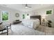Serene main bedroom with plush carpet, neutral colors, and lots of natural light at 1315 Charles Ave, Charlotte, NC 28205