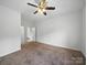 Bedroom with plush carpeting, ceiling fan, and neutral color scheme at 1340 Canter Ln, York, SC 29745