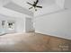 Bright and airy main bedroom with high ceilings, ceiling fan, and large windows at 1340 Canter Ln, York, SC 29745