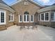 Lovely brick home featuring a concrete patio with furniture at 1340 Canter Ln, York, SC 29745
