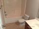 Clean bathroom features a tub-shower combo, neutral walls and flooring, and a modern vanity at 13441 Calloway Glen Dr, Charlotte, NC 28273