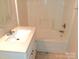 This bathroom offers modern fixtures and a tub-shower combo at 13441 Calloway Glen Dr, Charlotte, NC 28273