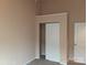 Neutral bedroom with closet and interior door at 13441 Calloway Glen Dr, Charlotte, NC 28273