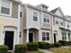 Well-maintained townhouse exteriors with manicured greenery and inviting facades at 13441 Calloway Glen Dr, Charlotte, NC 28273