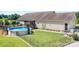 Inviting backyard featuring an above-ground pool, deck, and well-manicured lawn at 136 Barringer Dr, Statesville, NC 28625