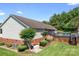Landscaped backyard includes an above-ground pool and deck, providing a serene retreat at 136 Barringer Dr, Statesville, NC 28625