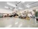 Spacious garage with vehicle, storage, overhead lighting and door, with ample space for projects and parking at 136 Barringer Dr, Statesville, NC 28625