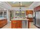 Gourmet kitchen with stainless steel appliances, granite countertops, and a center island at 145 Hunters Pointe Ln, Mooresville, NC 28117