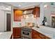 Close up of stainless steel stove and range hood at 145 Hunters Pointe Ln, Mooresville, NC 28117