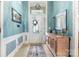 Inviting foyer featuring decorative mirror, a coat rack, and a stylish rug and decor at 15152 Legend Oaks Ct, Indian Land, SC 29707