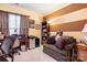 Cozy home office with a desk, comfortable seating, and ample storage space at 15152 Legend Oaks Ct, Indian Land, SC 29707