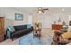 Cozy living room with a soft blue rug and comfortable seating at 1543 Ab Moore Jr Dr, Indian Trail, NC 28079