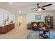Well-lit living area with comfortable seating, offering a cozy and welcoming atmosphere at 1543 Ab Moore Jr Dr, Indian Trail, NC 28079