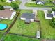 Expansive backyard with well-maintained lawn, fenced perimeter, patio, shed, and play equipment at 1744 Marsley Ln, Rock Hill, SC 29730