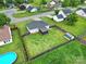 Backyard view featuring a well-maintained lawn, privacy fence, storage shed, and patio area at 1744 Marsley Ln, Rock Hill, SC 29730