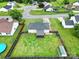 Backyard view featuring a well-maintained lawn, privacy fence, storage shed, and patio area at 1744 Marsley Ln, Rock Hill, SC 29730