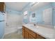 Bathroom featuring a vanity with sink and mirror, and a shower-tub combo at 1744 Marsley Ln, Rock Hill, SC 29730