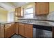 Kitchen featuring stainless steel appliances, granite counters, and a window above the sink at 1744 Marsley Ln, Rock Hill, SC 29730