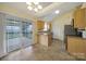 Kitchen featuring stainless appliances, granite counters, an island, and a sliding glass door to the deck at 1744 Marsley Ln, Rock Hill, SC 29730