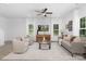 Modern living space with neutral décor, stylish furniture, and views of the outdoor landscape at 1815 Wildwood Dr, Charlotte, NC 28214