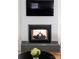 Close up of a modern fireplace in living room at 1833 The Plz, Charlotte, NC 28205