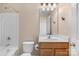 Bathroom with updated fixtures, including modern vanity and matching medicine cabinet at 1907 Sandal Brook Rd, Fort Mill, SC 29707