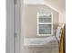Bedroom with a comfortable bed with a decorative headboard, a large window, and a ceiling fan at 1907 Sandal Brook Rd, Fort Mill, SC 29707