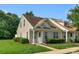 Charming home featuring light siding, well-manicured lawn, and tasteful landscaping at 1907 Sandal Brook Rd, Fort Mill, SC 29707