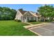Attractive townhome with lush green lawn and well-maintained landscaping at 1907 Sandal Brook Rd, Fort Mill, SC 29707