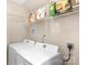 The laundry room features a washer, dryer, wire shelving, and cleaning supplies at 1907 Sandal Brook Rd, Fort Mill, SC 29707