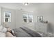 Well-lit bedroom featuring neutral tones, bright natural light, and comfortable furnishings at 198 Wrangell Dr, Mooresville, NC 28117