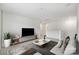 Bright living room with modern furnishings, a neutral color scheme, and ample natural light at 198 Wrangell Dr, Mooresville, NC 28117